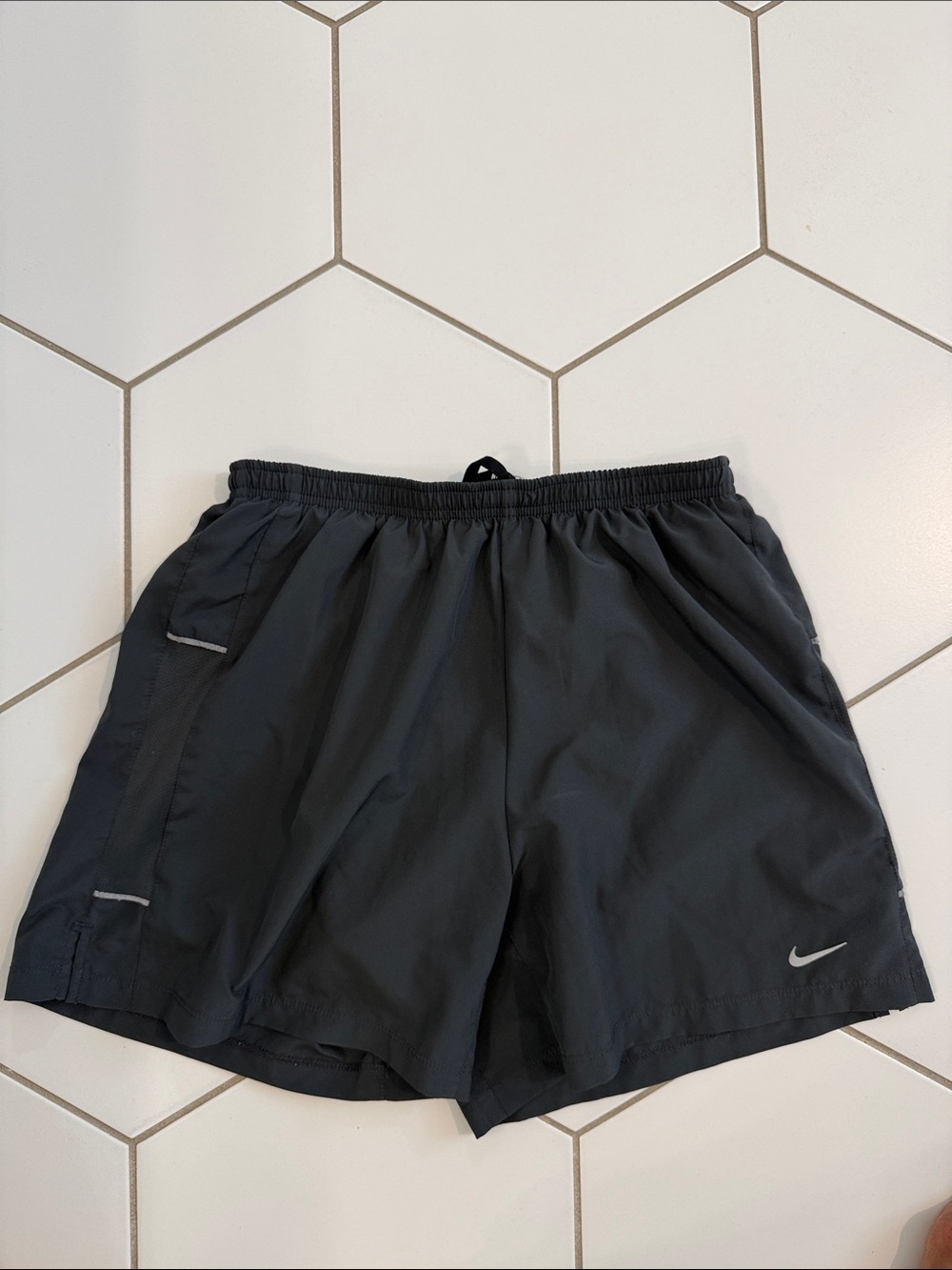 Nike Women's Dark Gray Athletic Shorts with Reflective Swoosh